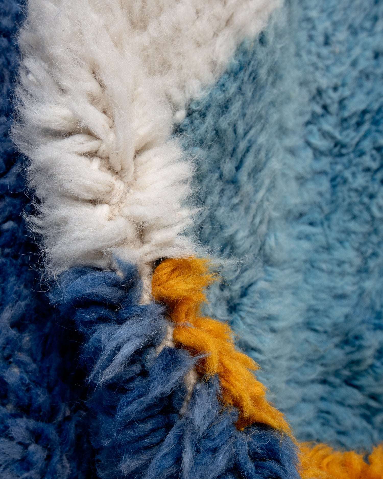 Modern, designer, handcrafted Berber rug from Morocco. Beniourain carpet with beautiful colours and patterns and fluffy wool texture.